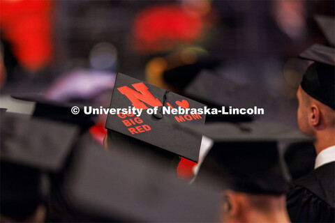 Alex Fernando listens to the ceremony as he awaits his MBA. Graduate Commencement at Pinnacle Bank A