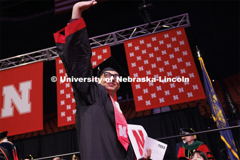 Zoyace Shrestha waves to family and friends after receiving his Engineering degree. Winter undergrad