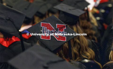 Decorated mortarboard at undergraduate commencement in Pinnacle Bank Arena. December 16, 2023. 