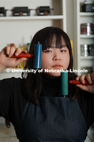 Amy Curtis, a junior in art, in printmaking class in Woods Art Building. January 24, 2024. 