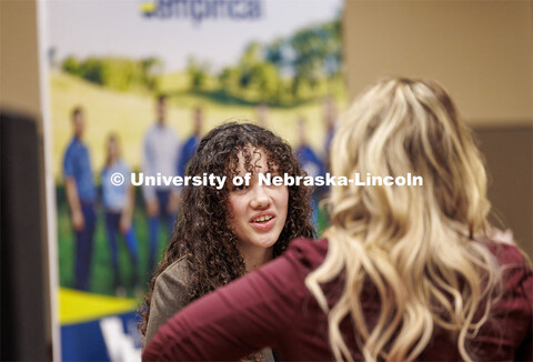 Marissa Davis talks with recruiters at the East Campus Career Fair. February 8, 2024. 