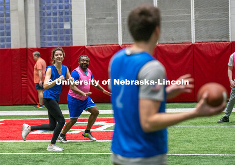 Professor Jean Marcel Ngoko Djiokap guards University of Nebraska-Lincoln student Delaney Knight fro