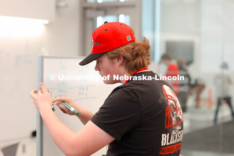 Volunteer, Nate Lind from Omaha, NE helping track scores. 2024 VEX Robotics Outreach Tournament host