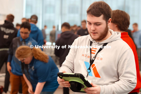 First Year UNL student from Omaha, NE, Cale Siegerson helps keep score. 2024 VEX Robotics Outreach T