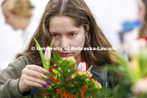 Students making floral arrangements. Stacy Adams teaches PLAS 261 - Floral Design I in the Plant Sci