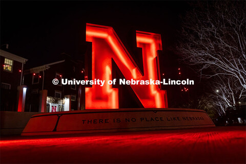 The N Sculpture and steps in front of Wick Alumni Center are lit with red lights for the Glow Big Re