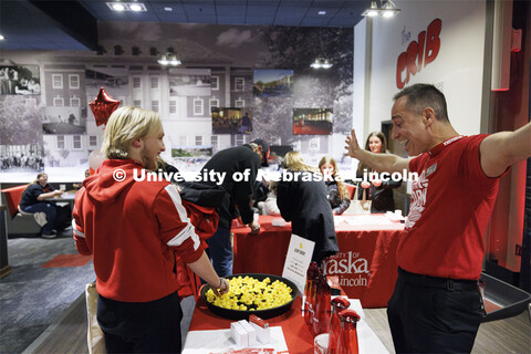 Chris Ebbers, right, reacts as Jeremiah Mohring of Elkhorn, Nebraska, won a gift certificate by pick