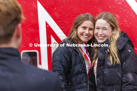 New fall roommates Aubrey Marra of Hall, Iowa, and Ella Shidler of Omaha pose for a photo in front o