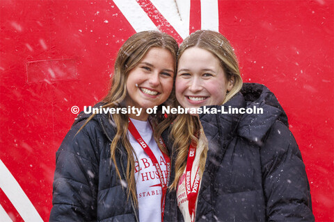 New fall roommates Aubrey Marra of Hall, Iowa, and Ella Shidler of Omaha pose for a photo in front o