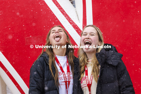 New fall roommates Aubrey Marra of Hall, Iowa, and Ella Shidler of Omaha pose for a photo in front o