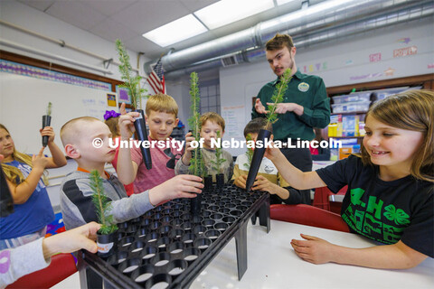 Jack Hilgert, Conservation Education Coordinator for the Nebraska Forest Service, teaches second gra