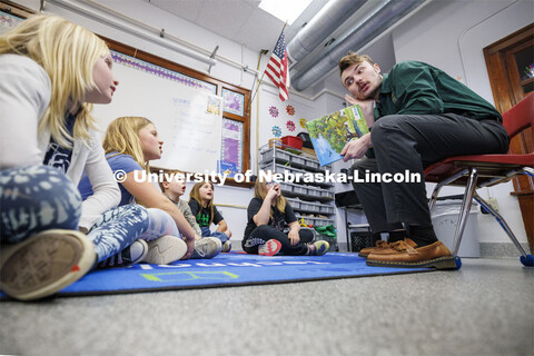 Jack Hilgert, Conservation Education Coordinator for the Nebraska Forest Service, teaches second gra