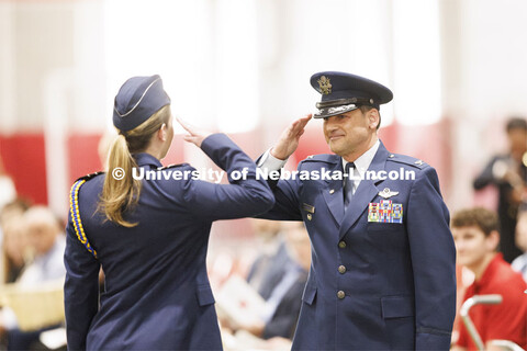 Retired Col. Joe Brownell, executive director of the military/veteran success center, returns the sa