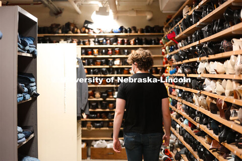 Hunter Rock organizes costumes for cast for the UNL production “Big Fish”. April 22, 2024. 