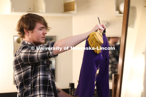 Hunter Rock organizes costumes for UNL’s production of “Big Fish”. April 23, 2024. 