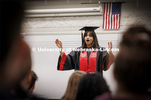 Ananya Amarnath, a May 2024 music education graduate, conducts the Papillion-La Vista South choir as