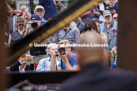 The crowd listened and photographed Paul Barnes, Marguerite Scribante Professor of Piano in the Glen