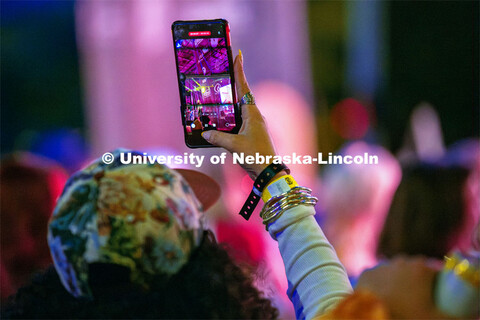 A fan snaps a photo of Cherry Glazerr performs on the main stage at the 20th Annual Lincoln Calling 