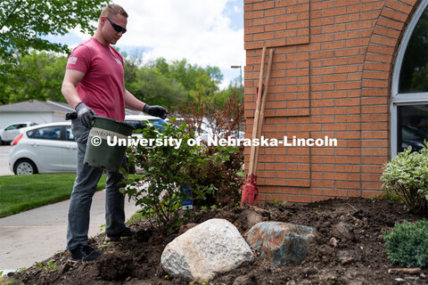 University of Nebraska-Lincoln student Preston Erks looks at his handy work of his planting job at t