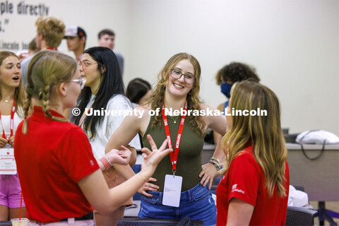 Students talk with new friends as they discuss aspects of coming to UNL. NSE New Student Enrollment.