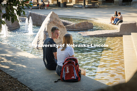 Students relaxing by Broyhill Fountain. On campus filming. Behind the scenes photo for the universit