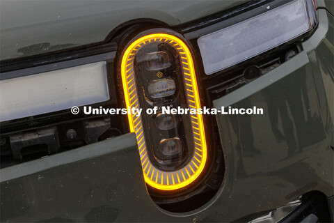 Close up view of the front end of a Rivian R1T truck used in research sponsored by the U.S. Army Eng