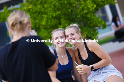 Elizabeth and Danica McNatt of Omaha have their photo taken at the Block Party at Harper Schramm Smi