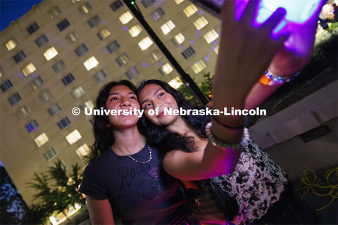 Jasmine Morales and Adilene Beltran, both freshmen from Grand Island, take a selfie at the block par