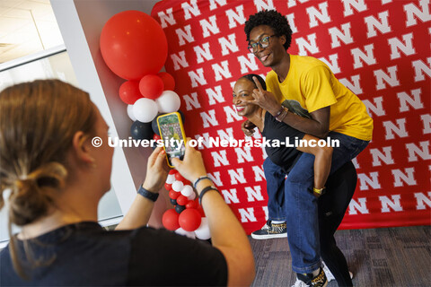 Shardea Gallion gives her son, Isaiah Vasser, some last-minute support as they are photographed by S