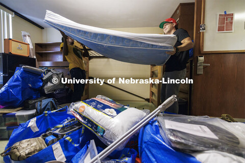 Isaiah Vasser from St. Louis and 8th floor Smith RA Broc Homeyer lower Isaiah’s bunk bed during mo