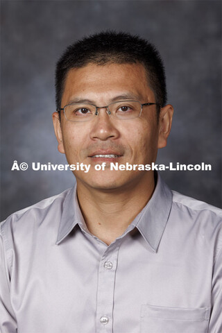 Studio portrait of Liang He, Associate Professor, School of Computing. August 21, 2024. 