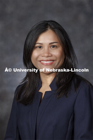 Studio portrait of Duan Loy, Research Assistant Professor, School of Veterinary Medicine and Biomedi