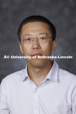 Studio portrait of Xiangmin Sun, Research Assistant Professor, School of Natural Resources. August 2