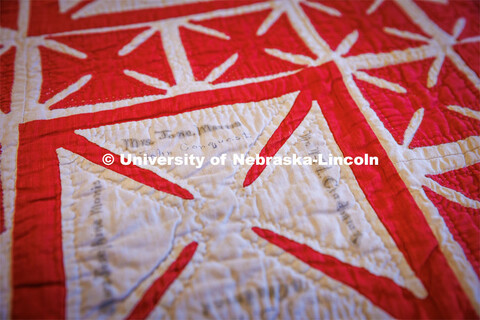 Names are visible on a quilt that the Genealogical Task Force recently examined.

International Quil