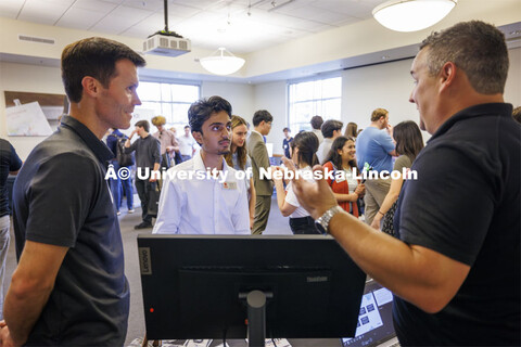 Raikes Design Studio held a job fair in the Gaughan Center where students meet the clients in a job 