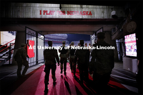 Army ROTC cadets enter the field through the tunnel walk. 9/11 stair climb in Memorial Stadium to co