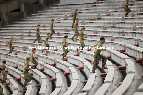 Army ROTC cadets climb the steps in west stadium. 9/11 stair climb in Memorial Stadium to commemorat