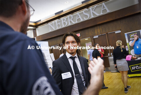 Sergio Zavala listens to recruiters during the Career Fair in the Nebraska Union. September 17, 2024