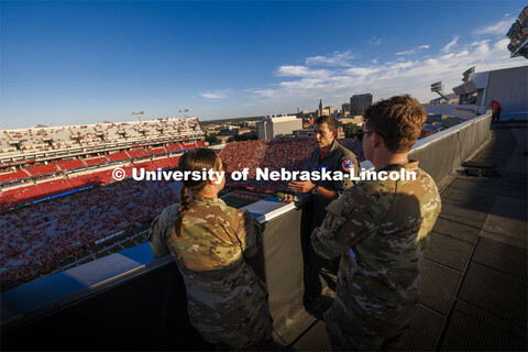 From atop the west stadium roof, Air National Guard Major Bobby Sullivan with the 175th fighter squa