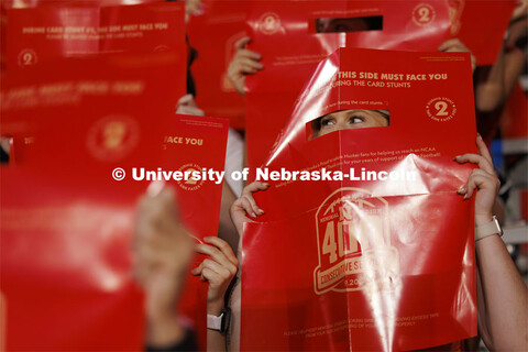 Sarah Griess looks through her flip card as the east stadium lower bowl fans spelled out a 400th con