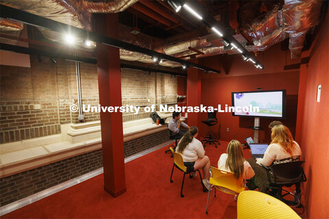 Students studying in a study space in the newly renovated Architecture Hall. Architecture photo shoo