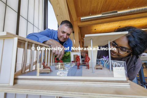 Professor Jeffrey L. Day and a student look over a model. Architecture photo shoot. September 25, 20