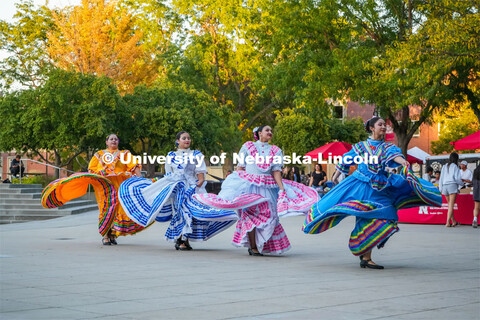 Lincoln's Sangre Azteca, twirl as part of a traditional Guadalajara dance during the University of N
