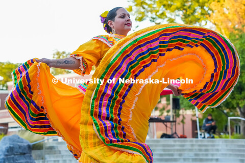 Rikki Neumann, a dancer from Lincoln's Sangre Azteca, twirls her skirt as part of a traditional Guad