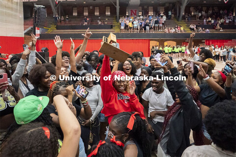 Afrikan Peoples Union president Mariah May raises the first place trophy after winning Showtime. Sho