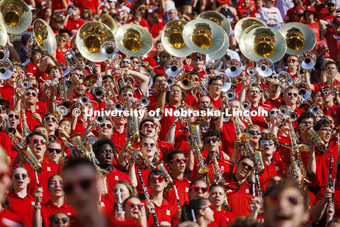 The Cornhusker Marching Band cheers during the second quarter. Nebraska vs Rutgers football game. Ho