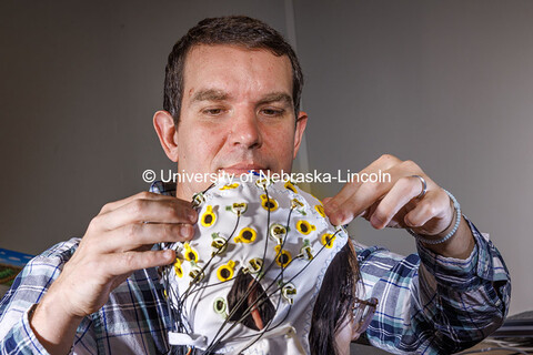 Kevin Pitt, Assistant Professor Special Education and Communication Disorders, demonstrates an elect