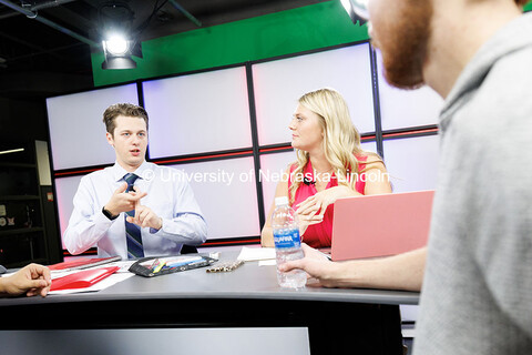 Sophomore Harmon Johnsen, left, helps plan Nebraska Nightly’s election night broadcast inside Ande