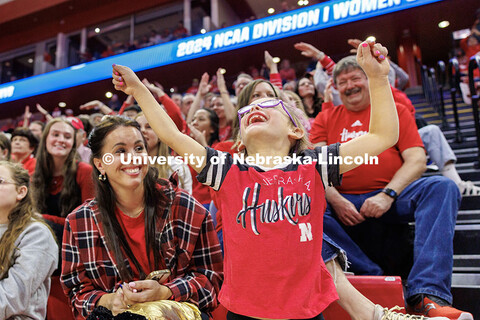 Grace Schaaret, 7, dances to "Y.M.C.A." by The Village People during a timeout in the third set of r