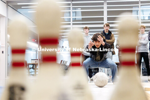 Juan Fontanez, sophomore, rolls his concrete ball towards the pins during the Concrete Bowling Compe